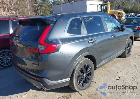 2023 Honda Cr-V Hybrid Sport Touring z USA, uszkodzony, nr VIN 2HKRS6H97PH810357